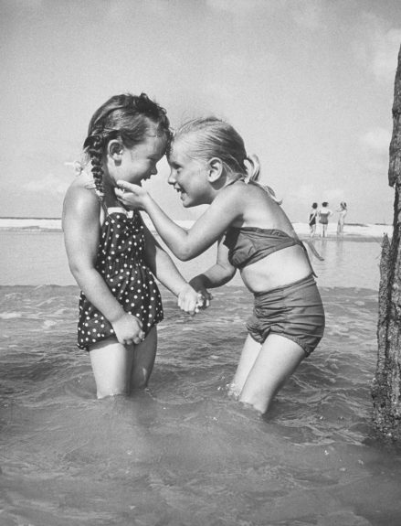 Little girls playing together on a beach.  (Photo by Lisa Larsen//Time Life Pictures/Getty Images)